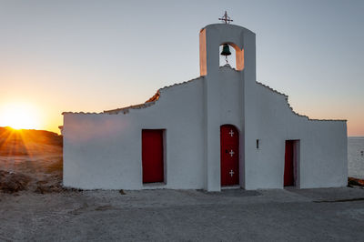 Exterior of building against sky during sunset