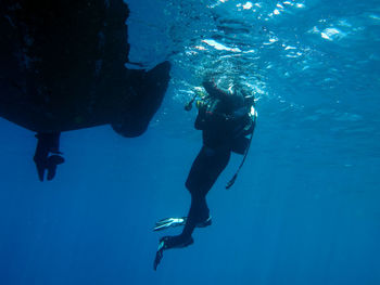 Man swimming in sea