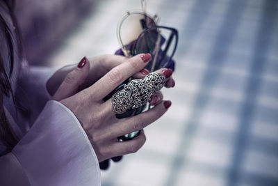 Close-up of woman holding hands