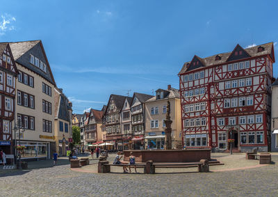 View of the historic market square with a fountain in butzbach, hesse, germany.