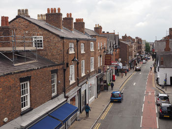 High angle view of street amidst buildings in city