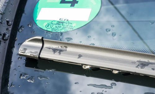 Close-up of water drops on car windshield