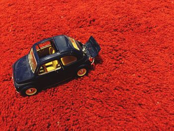 High angle view of toy car on field