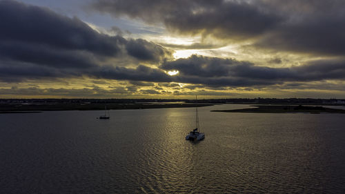 Scenic view of sea against sky at sunset