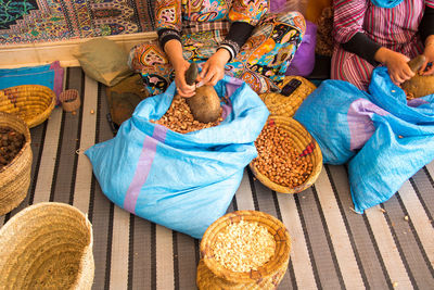 High angle view of woman holding food at market