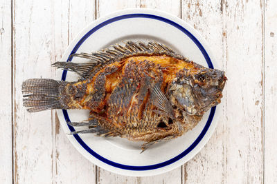 High angle view of fish in plate