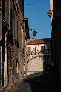 Alley amidst buildings in city