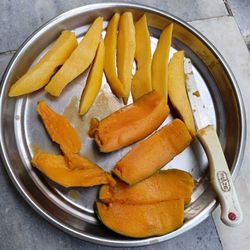 High angle view of vegetables in plate on table