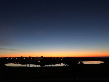 Scenic view of silhouette landscape against sky during sunset