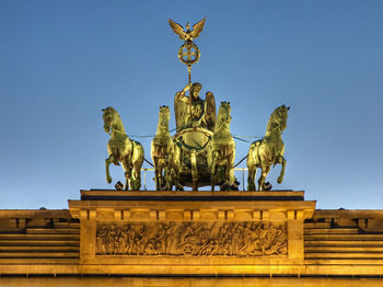 Low angle view of statue against clear sky