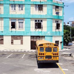 Bus parked in front of building