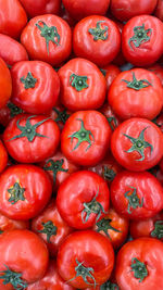 Full frame shot of red bell peppers for sale in market