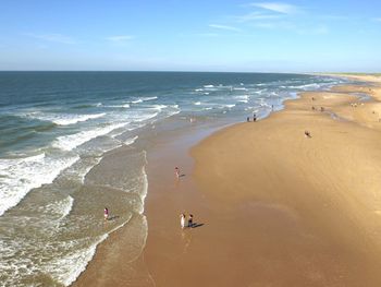 High angle view of man on beach against sky