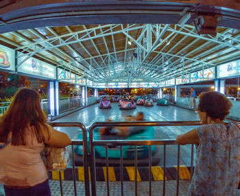 Rear view of people in amusement park