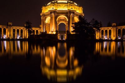 Reflection of illuminated buildings in water