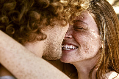 Happy young couple hugging