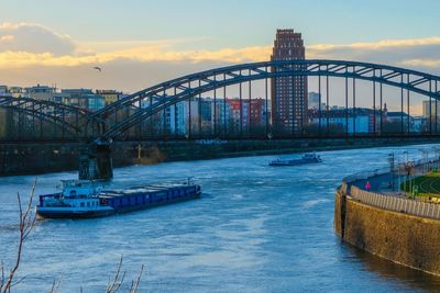 Scenic view of bridge over river against sky