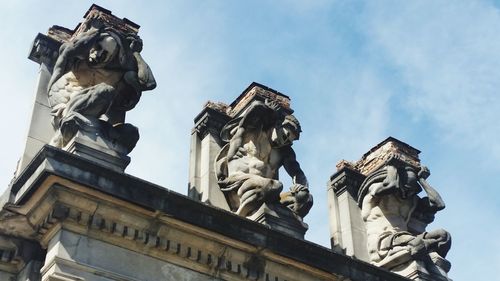 Low angle view of statue against sky