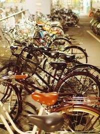 Close-up of bicycles in parking lot