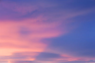 Low angle view of dramatic sky during sunset