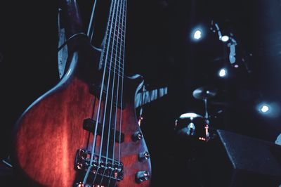 Close-up of guitar in darkroom