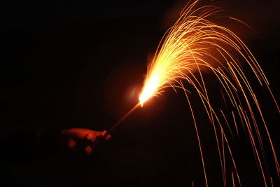 Firework display at night