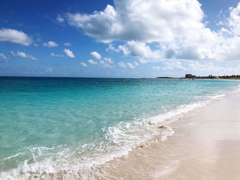 Scenic view of crystal clear sea against bright sky