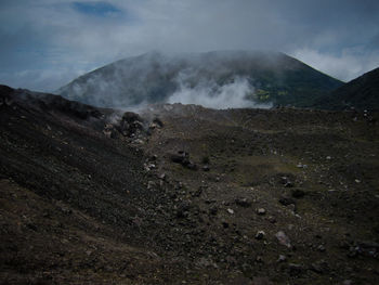 Scenic view of volcanic landscape against sky