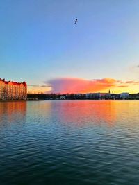 View of lake against sky during sunset
