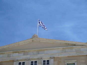 Low angle view of built structure against blue sky