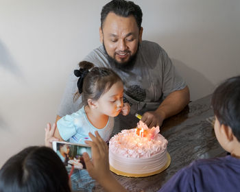 High angle view of family during birthday