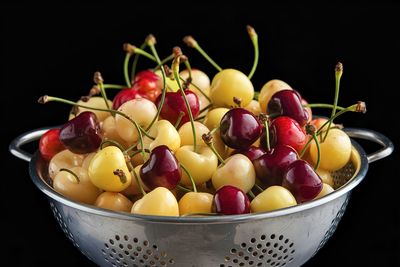 Close-up of fruits in bowl on table
