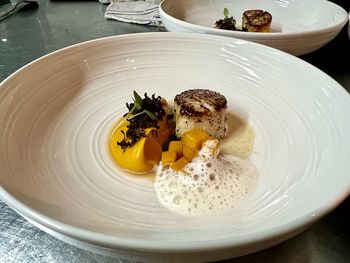 Seared scallop with pumpkin purée