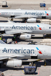 High angle view of airplane on airport runway