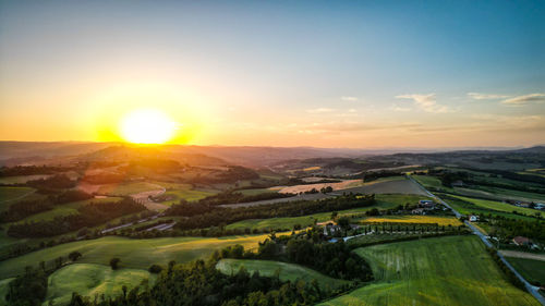 High angle view of townscape against sky during sunset