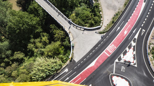 High angle view of road by trees