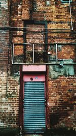 View of window on brick wall