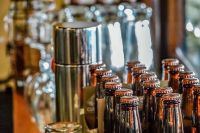 Close-up of beer and stainless steel glass