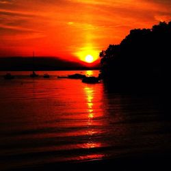 Scenic view of sea at sunset