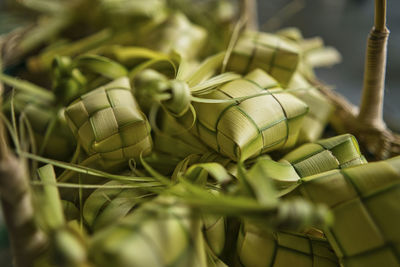 A bunch of ketupat,  traditional malay cuisine made with coconut leaves for eid celebration. 