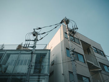 Low angle view of buildings against clear sky