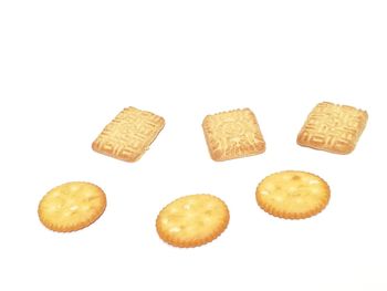 Close-up of cookies against white background