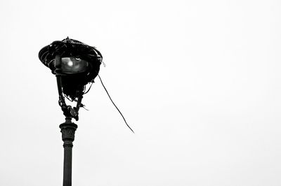 Low angle view of street light against clear sky