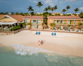 People by swimming pool at beach