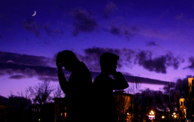 Silhouette of people at concert