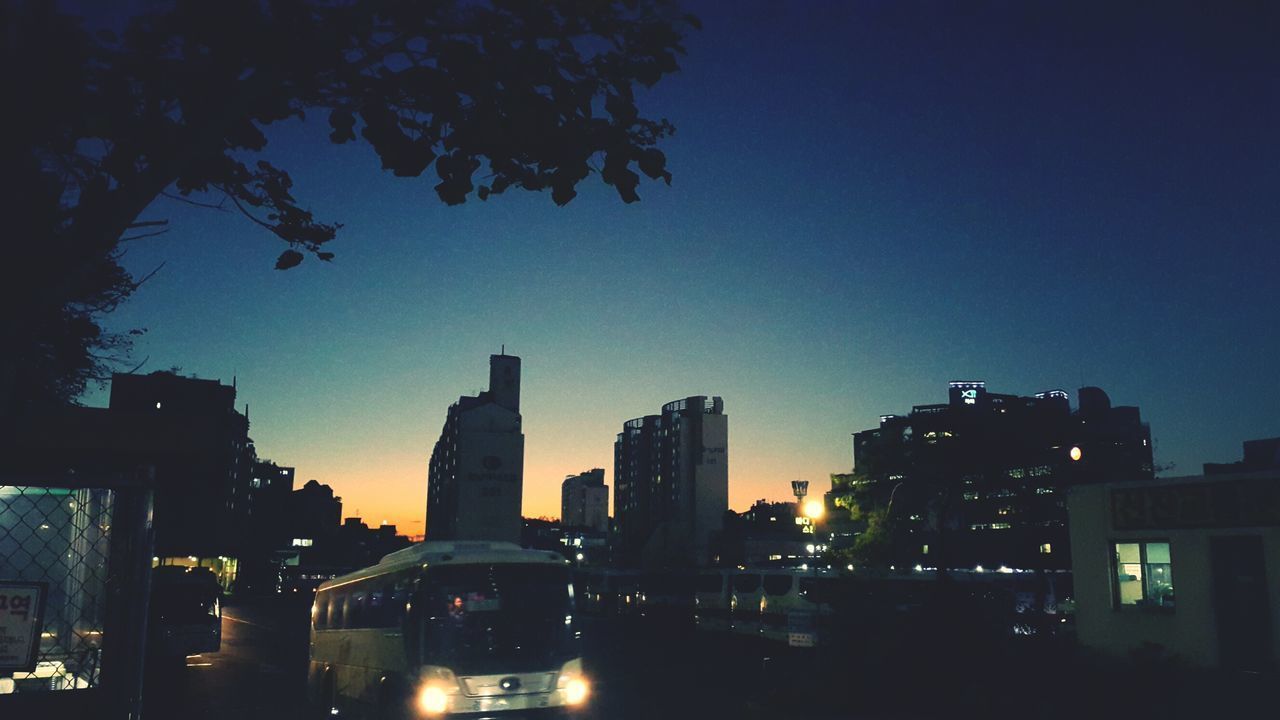 VIEW OF CITY AT NIGHT