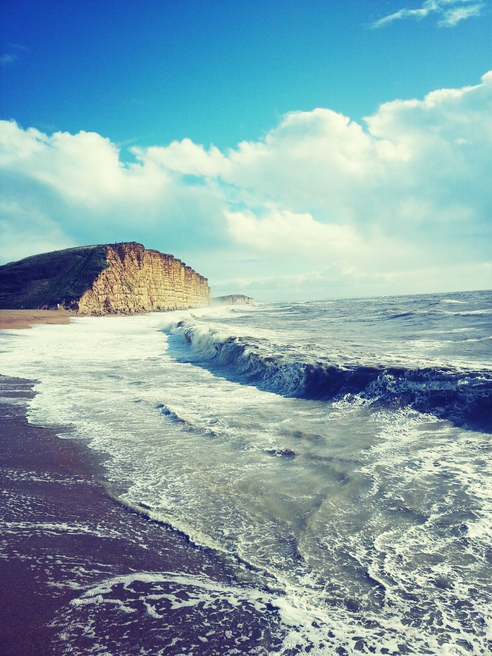 View of calm blue sea against the sky