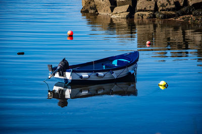 Boat floating on lake