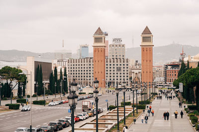 Buildings in city against sky