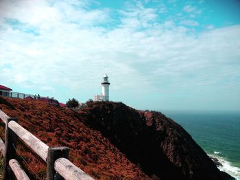 Lighthouse by sea coast